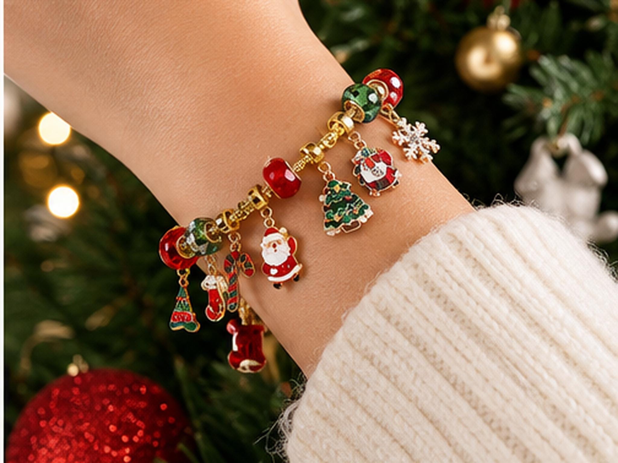 Open bracelet advent calendar showing small compartments with charms and beads arranged inside